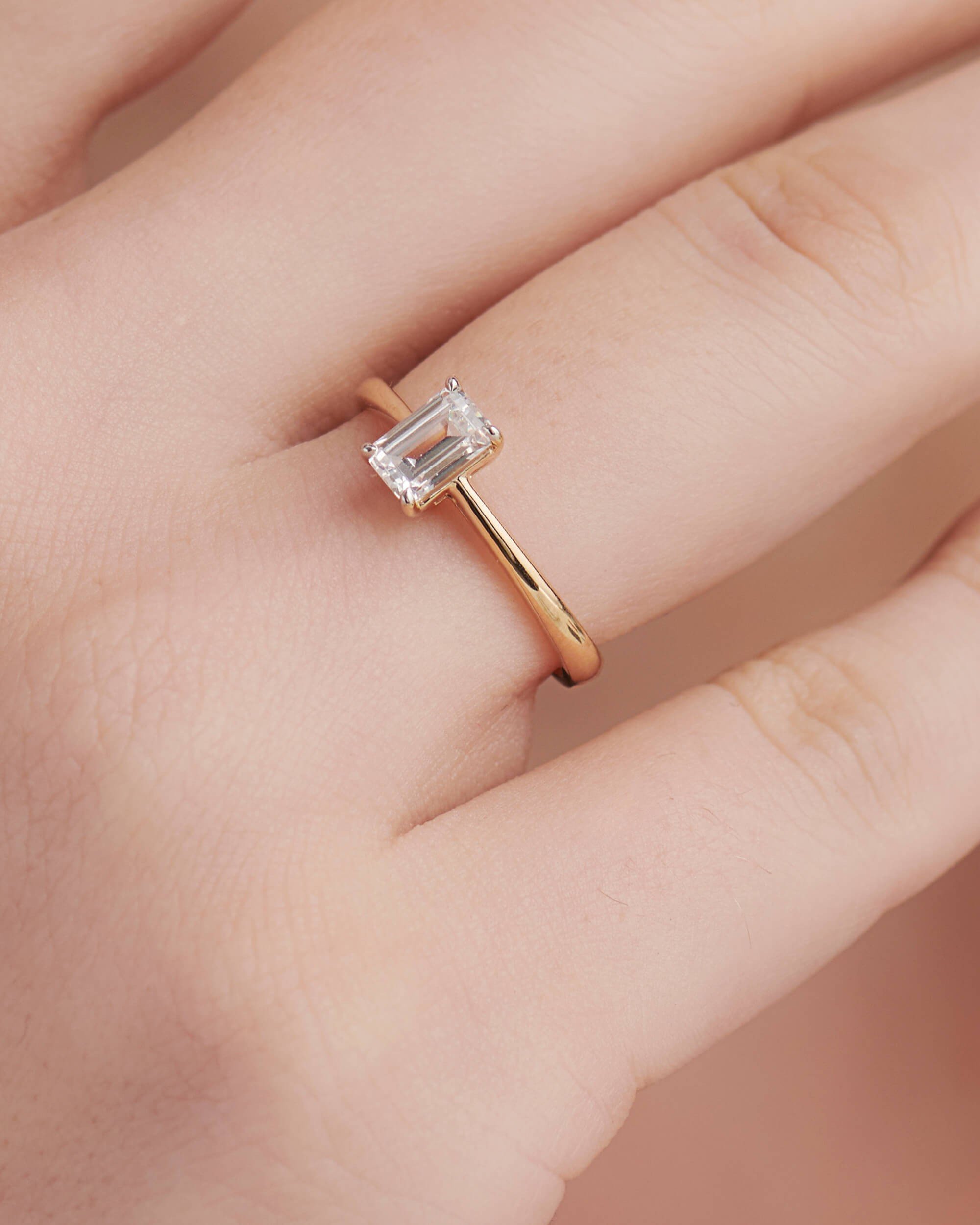 3 carat emerald cut diamond ring